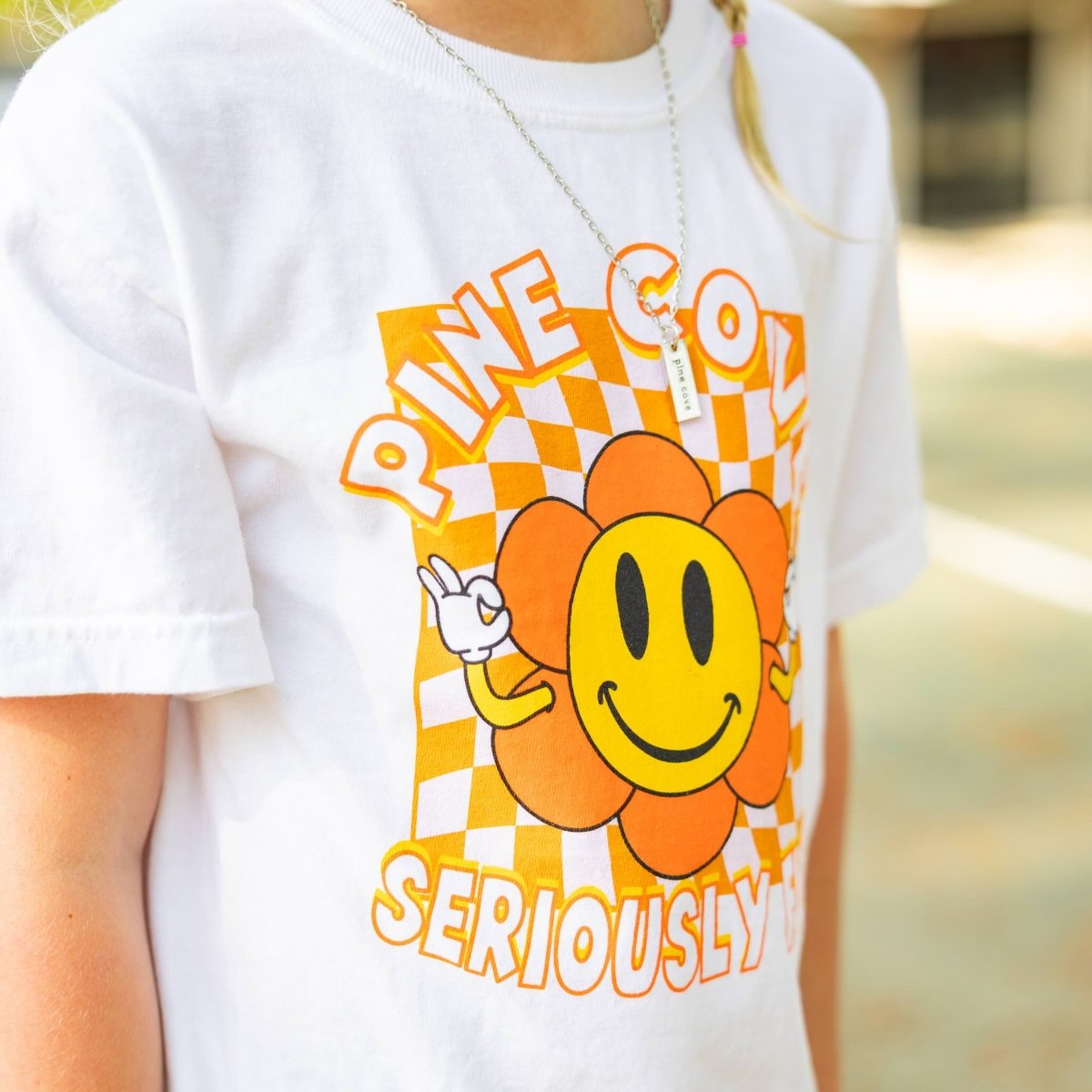 Youth Checkerboard Flower Tee - Pine Cove Web Store